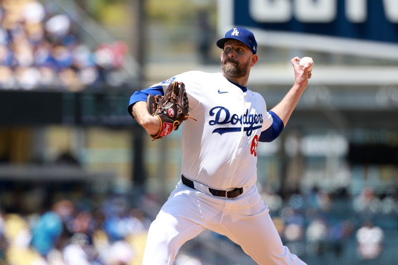 May 5, 2024; Los Angeles, California, USA;  Los Angeles Dodgers pitcher James Paxton (65) pitches during the second inning against the Atlanta Braves at Dodger Stadium. Mandatory Credit: Kiyoshi Mio-USA TODAY Sports