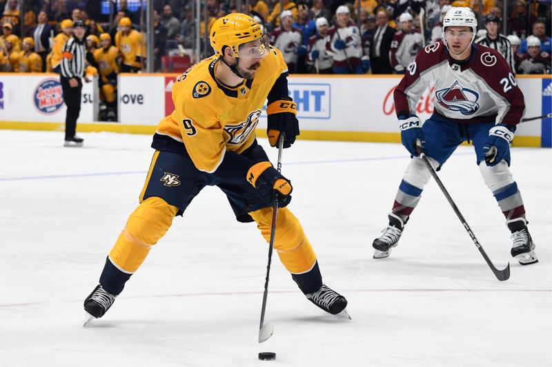 Mar 2, 2024; Nashville, Tennessee, USA; Nashville Predators left wing Filip Forsberg (9) skates with the puck during the first period against the Colorado Avalanche at Bridgestone Arena. Mandatory Credit: Christopher Hanewinckel-USA TODAY Sports