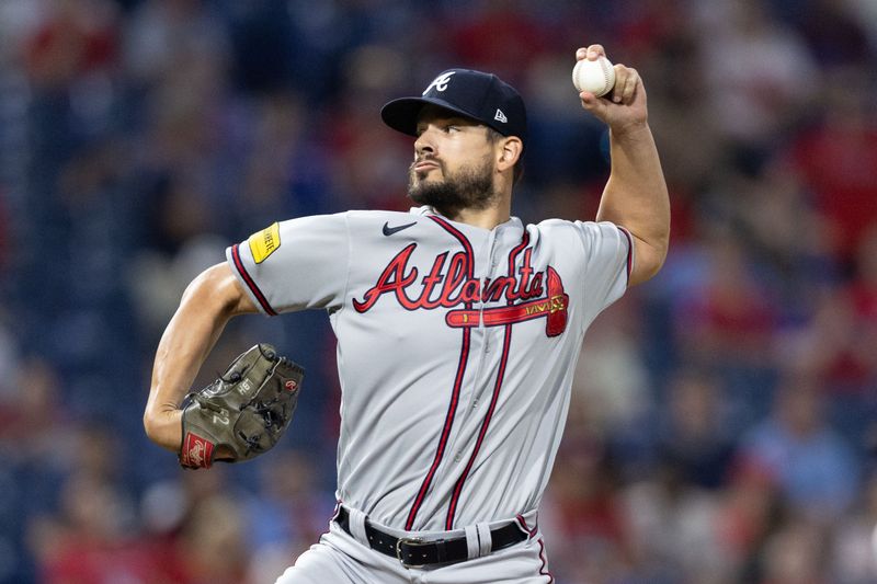 Sep 12, 2023; Philadelphia, Pennsylvania, USA; Atlanta Braves relief pitcher Brad Hand (45) throws a pitch during the tenth inning Philadelphia Phillies at Citizens Bank Park. Mandatory Credit: Bill Streicher-USA TODAY Sports