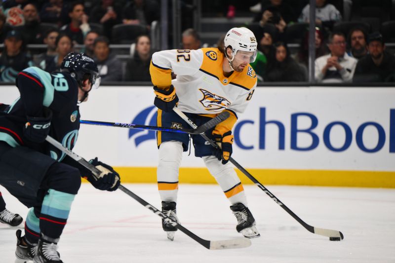 Mar 16, 2024; Seattle, Washington, USA; Nashville Predators center Tommy Novak (82) plays the puck during the third period against the Seattle Kraken at Climate Pledge Arena. Mandatory Credit: Steven Bisig-USA TODAY Sports