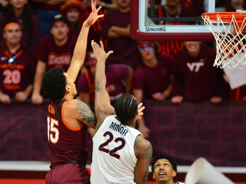 Feb 19, 2024; Blacksburg, Virginia, USA; Virginia Tech Hokies center Lynn Kidd (15) shoots a shot as Virginia Cavaliers forward Jordan Minor (22) defends during the first half at Cassell Coliseum. Mandatory Credit: Brian Bishop-USA TODAY Sports