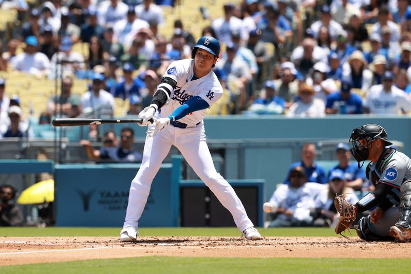 May 8, 2024; Los Angeles, California, USA;  Los Angeles Dodgers designated hitter Shohei Ohtani (17) strike out during the third inning against the Miami Marlins at Dodger Stadium. Mandatory Credit: Kiyoshi Mio-USA TODAY Sports