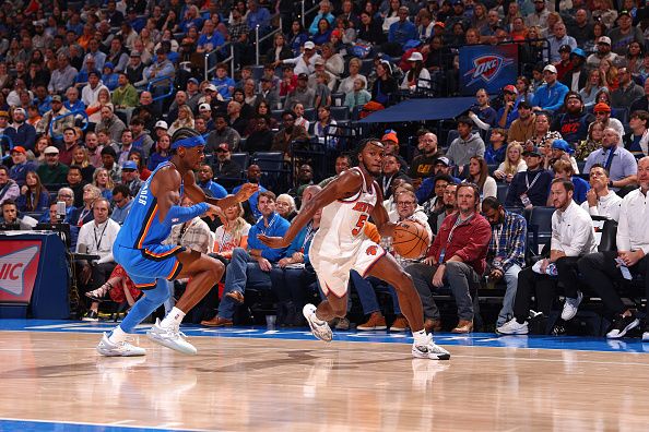 OKLAHOMA CITY, OK - DECEMBER 27: Immanuel Quickley #5 of the New York Knicks drives to the basket during the game against the Oklahoma City Thunder on December 27, 2023 at Paycom Arena in Oklahoma City, Oklahoma. NOTE TO USER: User expressly acknowledges and agrees that, by downloading and or using this photograph, User is consenting to the terms and conditions of the Getty Images License Agreement. Mandatory Copyright Notice: Copyright 2023 NBAE (Photo by Zach Beeker/NBAE via Getty Images)