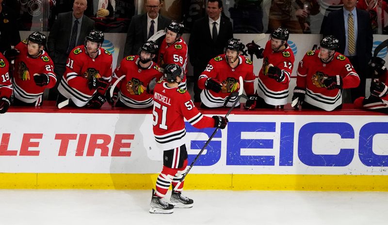 Jan 22, 2023; Chicago, Illinois, USA; Chicago Blackhawks defenseman Ian Mitchell (51) celebrates his goal against the Los Angeles Kings during the third period at United Center. Mandatory Credit: David Banks-USA TODAY Sports