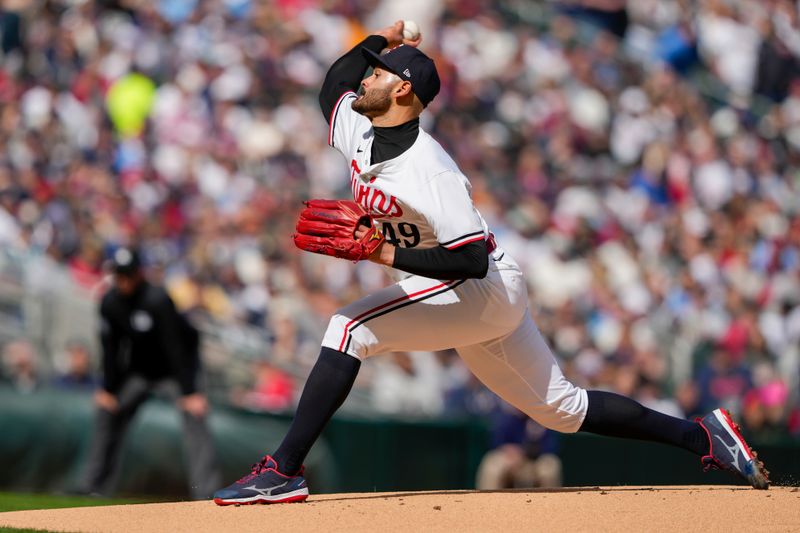 Apr 4, 2024; Minneapolis, Minnesota, USA; Minnesota Twins starting pitcher Pablo Lopez (49) delivers a pitch during the first inning against the Cleveland Guardians Target Field. Mandatory Credit: Jordan Johnson-USA TODAY Sports