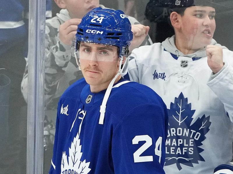 Nov 12, 2024; Toronto, Ontario, CAN; Toronto Maple Leafs center Connor Dewar (24) skates during the warmup against the Ottawa Senators at Scotiabank Arena. Mandatory Credit: Nick Turchiaro-Imagn Images