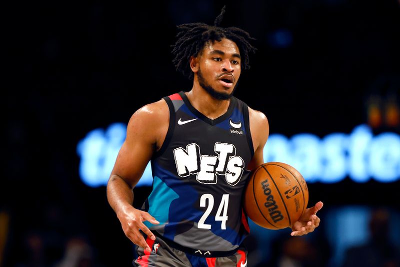 NEW YORK, NEW YORK - NOVEMBER 30: Cam Thomas #24 of the Brooklyn Nets dribbles during the second half against the Charlotte Hornets at Barclays Center on November 30, 2023 in the Brooklyn borough of New York City. The Hornets won 129-128. NOTE TO USER: User expressly acknowledges and agrees that, by downloading and/or using this Photograph, user is consenting to the terms and conditions of the Getty Images License Agreement. (Photo by Sarah Stier/Getty Images)