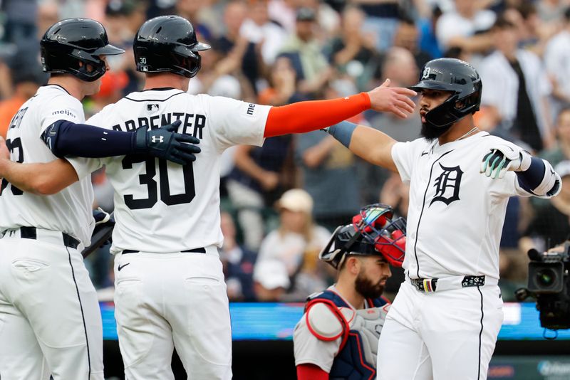 May 12, 2025; Detroit, Michigan, USA;  Detroit Tigers second base Gleyber Torres (25) celebrates with outfielder Kerry Carpenter (30) and second base Colt Keith (33) after he hits a two run home run first inning against the Boston Red Sox at Comerica Park. Mandatory Credit: Rick Osentoski-Imagn Images