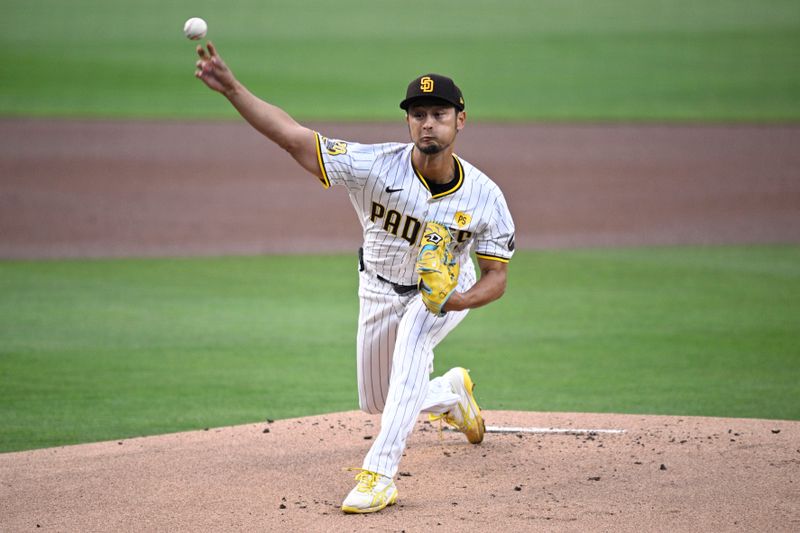 Apr 30, 2024; San Diego, California, USA; San Diego Padres starting pitcher Yu Darvish (11) throws a pitch against the Cincinnati Reds during the first inning at Petco Park. Mandatory Credit: Orlando Ramirez-USA TODAY Sports