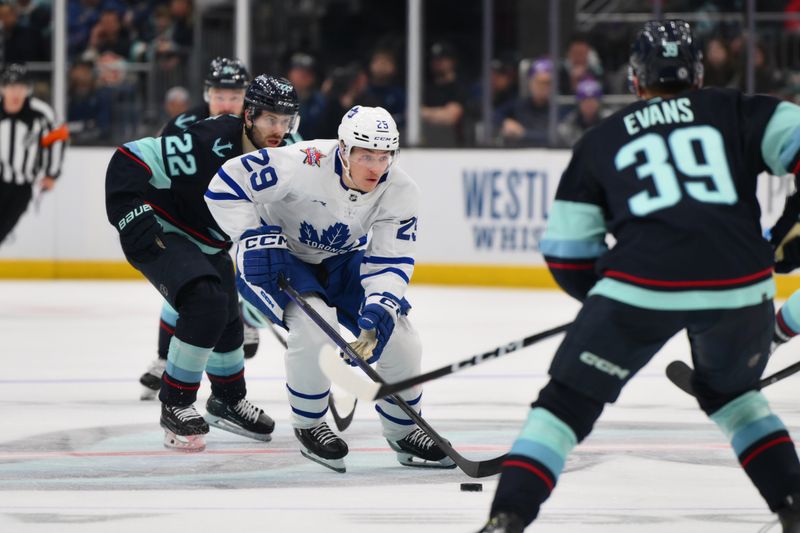 Jan 21, 2024; Seattle, Washington, USA; Toronto Maple Leafs right wing Pontus Holmberg (29) advances the puck against the Seattle Kraken during the third period at Climate Pledge Arena. Mandatory Credit: Steven Bisig-USA TODAY Sports