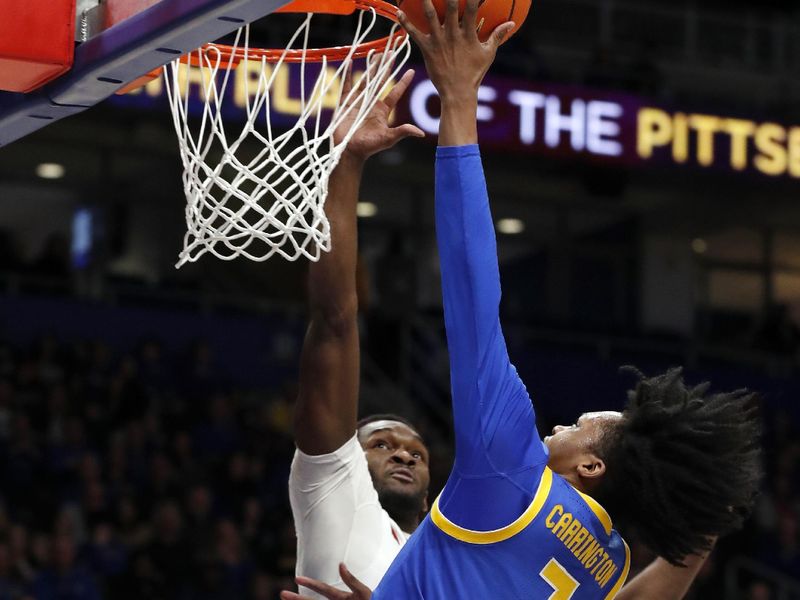 Feb 17, 2024; Pittsburgh, Pennsylvania, USA;  Pittsburgh Panthers guard Carlton Carrington (7) shoots against Louisville Cardinals forward Brandon Huntley-Hatfield (left) during the first half at the Petersen Events Center. Mandatory Credit: Charles LeClaire-USA TODAY Sports