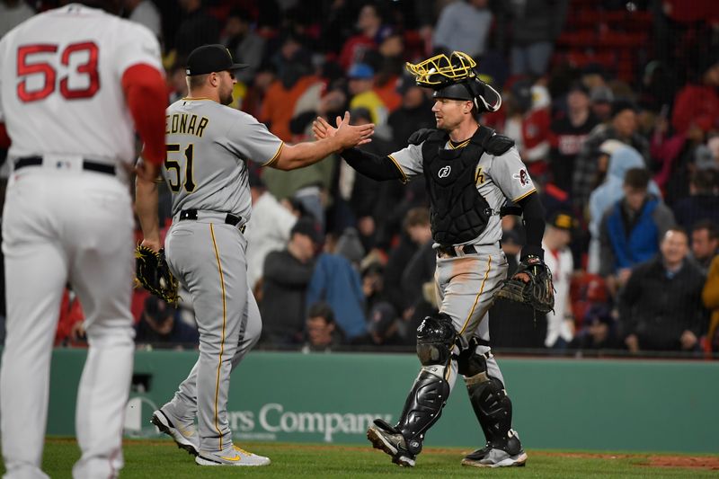 Apr 4, 2023; Boston, Massachusetts, USA;  Pittsburgh Pirates relief pitcher David Bednar (51) is congratulated by catcher Tyler Heineman (54) after defeating the Boston Red Sox at Fenway Park. Mandatory Credit: Bob DeChiara-USA TODAY Sports