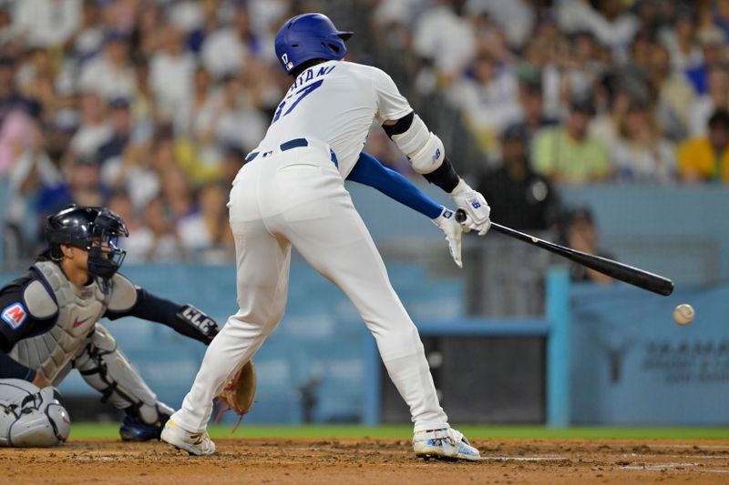 Sep 6, 2024; Los Angeles, California, USA;  Los Angeles Dodgers designated hitter Shohei Ohtani (17) strikes out in the third inning against the Cleveland Guardians at Dodger Stadium. Mandatory Credit: Jayne Kamin-Oncea-Imagn Images