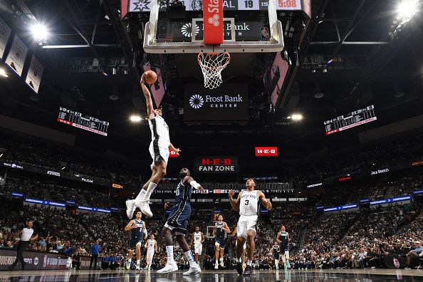 SAN ANTONIO, TX - OCTOBER 25: Devin Vassell #24 of the San Antonio Spurs dunks the ball during the game against the Dallas Mavericks on October 25, 2023 at the Frost Bank Center in San Antonio, Texas. NOTE TO USER: User expressly acknowledges and agrees that, by downloading and or using this photograph, user is consenting to the terms and conditions of the Getty Images License Agreement. Mandatory Copyright Notice: Copyright 2023 NBAE (Photos by Andrew D. Bernstein/NBAE via Getty Images)