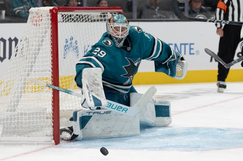 Oct 1, 2024; San Jose, California, USA;  San Jose Sharks goaltender Mackenzie Blackwood (29) defends the goal during the third period against the Utah Hockey Club at SAP Center at San Jose. Mandatory Credit: Stan Szeto-Imagn Images
