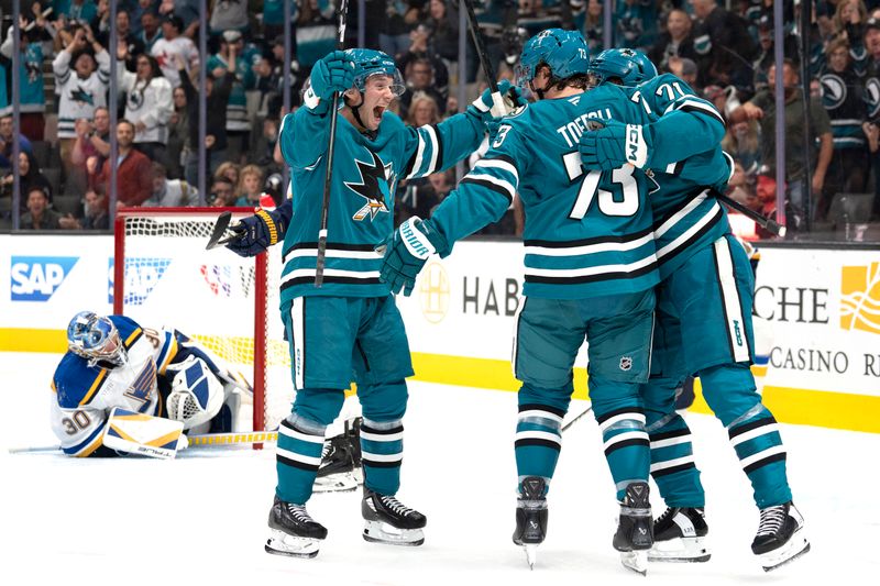 Oct 10, 2024; San Jose, California, USA; San Jose Sharks left wing William Eklund (72) celebrates with Tyler Toffoli (73) and center Macklin Celebrini (71) during the first period against the St. Louis Blues at SAP Center at San Jose. Mandatory Credit: Stan Szeto-Imagn Images