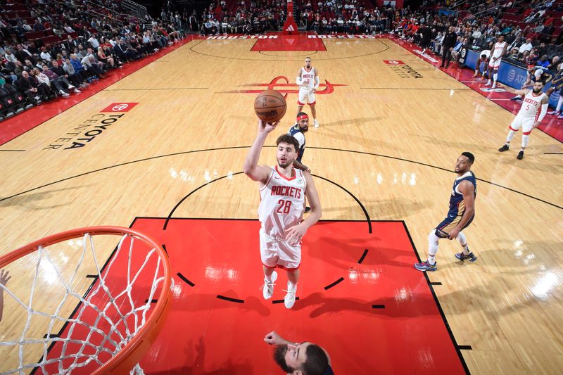 HOUSTON, TX - JANUARY 31:  Alperen Sengun #28 of the Houston Rockets shoots the ball during the game against the New Orleans Pelicans on January 31, 2024 at the Toyota Center in Houston, Texas. NOTE TO USER: User expressly acknowledges and agrees that, by downloading and or using this photograph, User is consenting to the terms and conditions of the Getty Images License Agreement. Mandatory Copyright Notice: Copyright 2024 NBAE (Photo by Logan Riely/NBAE via Getty Images)