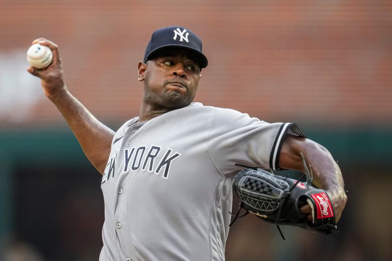 Aug 15, 2023; Cumberland, Georgia, USA; New York Yankees starting pitcher Luis Severino (40) pitches against the Atlanta Braves during the first inning at Truist Park. Mandatory Credit: Dale Zanine-USA TODAY Sports