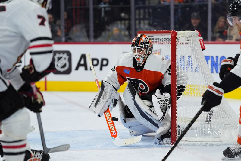 Nov 23, 2024; Philadelphia, Pennsylvania, USA; Philadelphia Flyers goalie Aleksei Kolosov (35) allows a goal to Chicago Blackhawks left wing Patrick Maroon (77) in the second period at Wells Fargo Center. Mandatory Credit: Kyle Ross-Imagn Images