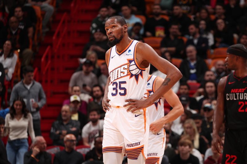 MIAMI, FL - JANUARY 29: Kevin Durant #35 of the Phoenix Suns looks on during the game against the Miami Heat on January 29, 2024 at Kaseya Center in Miami, Florida. NOTE TO USER: User expressly acknowledges and agrees that, by downloading and or using this Photograph, user is consenting to the terms and conditions of the Getty Images License Agreement. Mandatory Copyright Notice: Copyright 2024 NBAE (Photo by Issac Baldizon/NBAE via Getty Images)