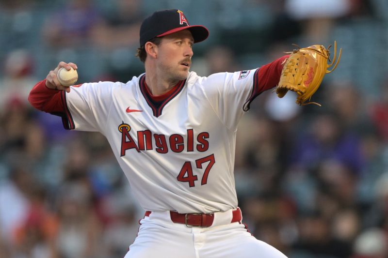 Jul 30, 2024; Anaheim, California, USA;  Los Angeles Angels starting pitcher Griffin Canning (47) delivers to the plate in the second inning against the Colorado Rockies at Angel Stadium. Mandatory Credit: Jayne Kamin-Oncea-USA TODAY Sports