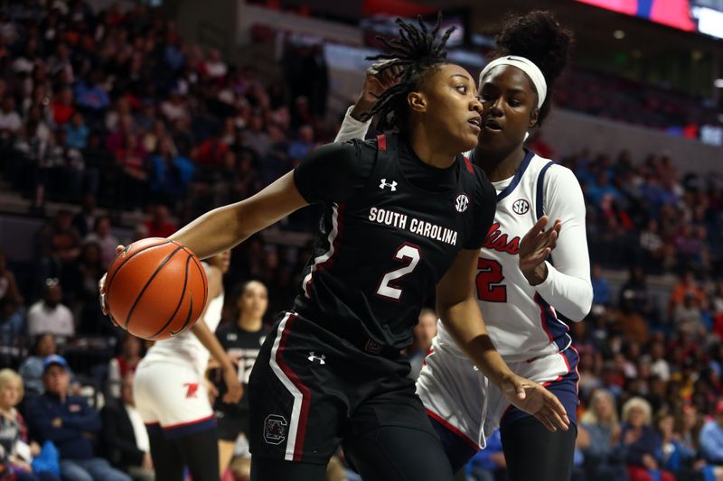 Feb 19, 2023; Oxford, Mississippi, USA; South Carolina Gamecocks forward Ashlyn Watkins (2) drives to the basket against Mississippi Rebels forward Tyia Singleton (22) during the first half at The Sandy and John Black Pavilion at Ole Miss. Mandatory Credit: Petre Thomas-USA TODAY Sports