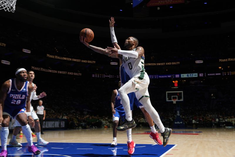 PHILADELPHIA, PA - OCTOBER 23: Damian Lillard #0 of the Milwaukee Bucks drives to the basket during the game against the Philadelphia 76ers on October 23, 2024 at the Wells Fargo Center in Philadelphia, Pennsylvania NOTE TO USER: User expressly acknowledges and agrees that, by downloading and/or using this Photograph, user is consenting to the terms and conditions of the Getty Images License Agreement. Mandatory Copyright Notice: Copyright 2024 NBAE (Photo by Jesse D. Garrabrant/NBAE via Getty Images)