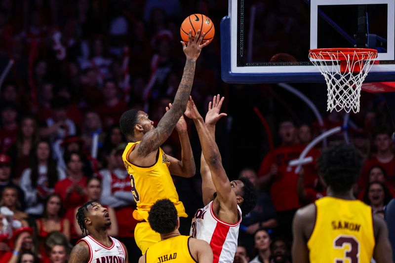 Mar 4, 2025; Tucson, Arizona, USA; Arizona State center Shawn Phillips Jr. (9) shoots over Arizona Wildcats forward Tobe Awaka (30) during the second half at McKale Center. Mandatory Credit: Aryanna Frank-Imagn Images