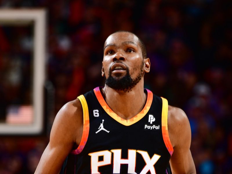 PHOENIX, AZ - APRIL 16:  Kevin Durant #35 of the Phoenix Suns looks on during the game During round one game one of the 2023 NBA Playoffs on April 16, 2023 at Footprint Center in Phoenix, Arizona. NOTE TO USER: User expressly acknowledges and agrees that, by downloading and or using this photograph, user is consenting to the terms and conditions of the Getty Images License Agreement. Mandatory Copyright Notice: Copyright 2023 NBAE (Photo by Barry Gossage/NBAE via Getty Images)