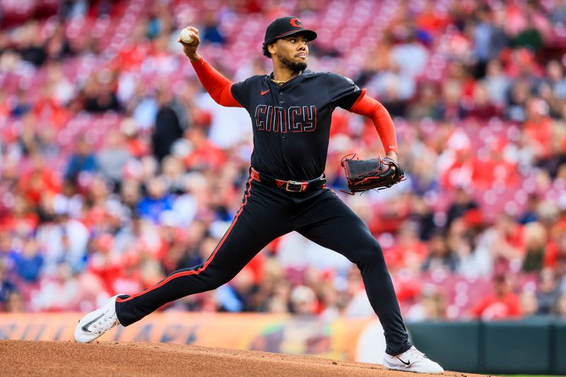 May 23, 2025; Cincinnati, Ohio, USA; Cincinnati Reds starting pitcher Hunter Greene (21) pitches against the Chicago Cubs in the first inning at Great American Ball Park. Mandatory Credit: Katie Stratman-Imagn Images