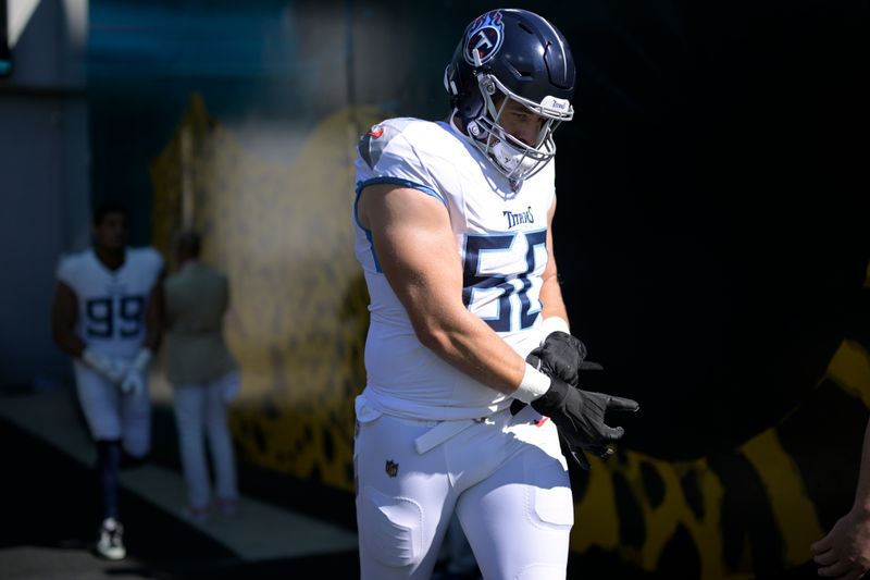 Tennessee Titans offensive tackle Daniel Brunskill (60) runs to the field before an NFL football game against the Jacksonville Jaguars, Sunday, Nov. 19, 2023, in Jacksonville, Fla. (AP Photo/Phelan M. Ebenhack)