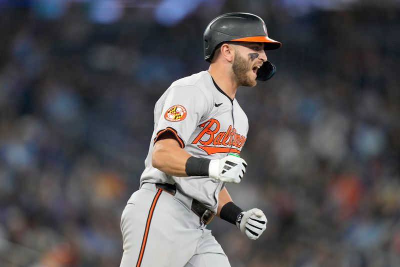 Jun 4, 2024; Toronto, Ontario, CAN; Baltimore Orioles second baseman Connor Norby (12) reacts after hitting a two-run home run against the Toronto Blue Jays during the eighth inning at Rogers Centre. Mandatory Credit: John E. Sokolowski-USA TODAY Sports