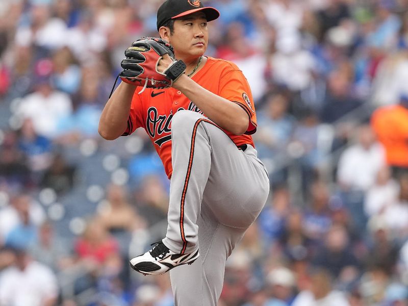 Sep 13, 2025; Toronto, Ontario, CAN; Baltimore Orioles starting pitcher Tomoyuki Sugano (19) throws a pitch against the Toronto Blue Jays during the first inning at Rogers Centre. Mandatory Credit: Nick Turchiaro-Imagn Images