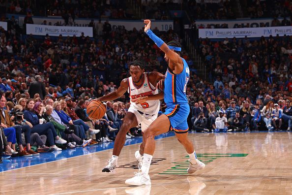 OKLAHOMA CITY, OK - DECEMBER 27: Immanuel Quickley #5 of the New York Knicks drives to the basket during the game against the Oklahoma City Thunder on December 27, 2023 at Paycom Arena in Oklahoma City, Oklahoma. NOTE TO USER: User expressly acknowledges and agrees that, by downloading and or using this photograph, User is consenting to the terms and conditions of the Getty Images License Agreement. Mandatory Copyright Notice: Copyright 2023 NBAE (Photo by Zach Beeker/NBAE via Getty Images)