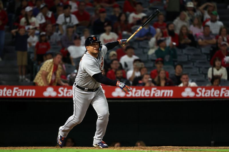 Sep 16, 2023; Anaheim, California, USA;  Detroit Tigers designated hitter Miguel Cabrera (24) hits an RBI single during the tenth inning against the Los Angeles Angels at Angel Stadium. Mandatory Credit: Kiyoshi Mio-USA TODAY Sports