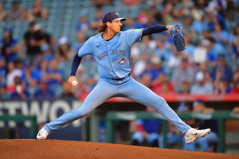 Aug 13, 2024; Anaheim, California, USA; Toronto Blue Jays pitcher Ryan Burr (43) throws against the Los Angeles Angels during the first inning at Angel Stadium. Mandatory Credit: Gary A. Vasquez-USA TODAY Sports