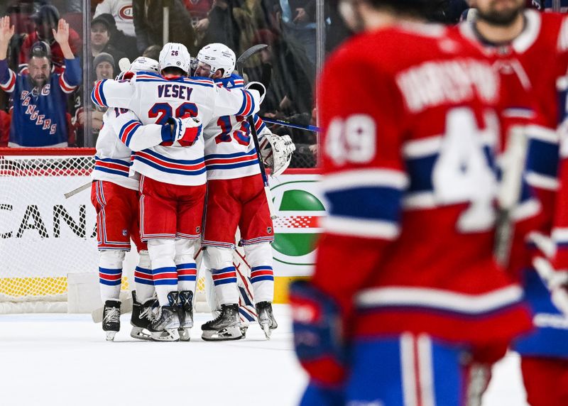 Mar 9, 2023; Montreal, Quebec, CAN; New York Rangers players gather to celebrate the win against the Montreal Canadiens after the end of the game at Bell Centre. Mandatory Credit: David Kirouac-USA TODAY Sports