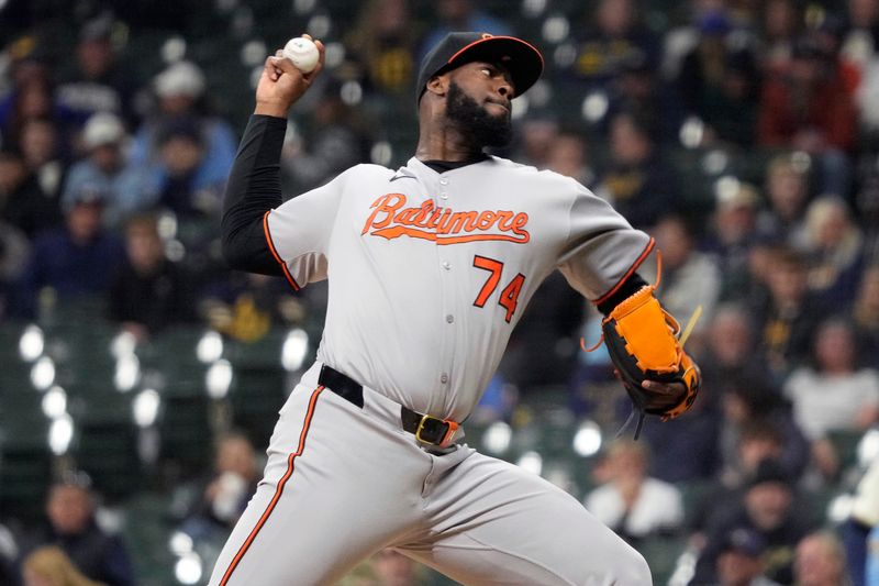 May 20, 2025; Milwaukee, Wisconsin, USA; Baltimore Orioles pitcher Félix Bautista (74) delivers a pitch against the Milwaukee Brewers in the eighth inning at American Family Field. Mandatory Credit: Michael McLoone-Imagn Images
