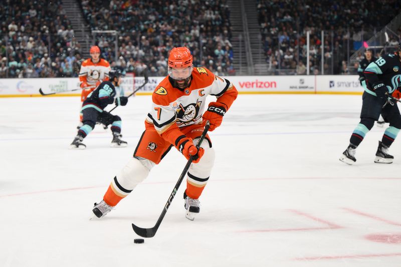 Nov 27, 2024; Seattle, Washington, USA; Anaheim Ducks defenseman Radko Gudas (7) plays the puck during the first period against the Seattle Kraken at Climate Pledge Arena. Mandatory Credit: Steven Bisig-Imagn Images