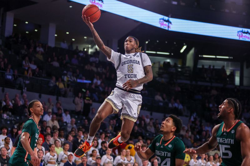 Jan 4, 2023; Atlanta, Georgia, USA; Georgia Tech Yellow Jackets guard Deivon Smith (5) shoots against the Miami Hurricanes in the second half at McCamish Pavilion. Mandatory Credit: Brett Davis-USA TODAY Sports