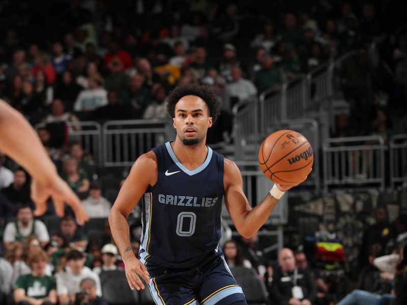 MILWAUKEE, WI - OCTOBER 20: Jacob Gilyard #0 of the Memphis Grizzlies looks to pass the ball during the preseason game on October 20, 2023 at the Fiserv Forum Center in Milwaukee, Wisconsin. NOTE TO USER: User expressly acknowledges and agrees that, by downloading and or using this Photograph, user is consenting to the terms and conditions of the Getty Images License Agreement. Mandatory Copyright Notice: Copyright 2023 NBAE (Photo by Gary Dineen/NBAE via Getty Images).