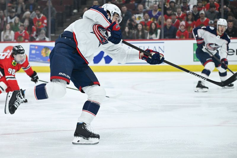 Mar 2, 2024; Chicago, Illinois, USA;  Columbus Blue Jackets center Alexandre Texier (42) scores a goal against the Chicago Blackhawks during the first period at the  United Center. Mandatory Credit: Matt Marton-USA TODAY Sports