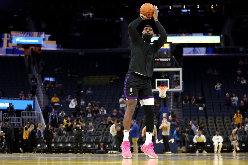 SAN FRANCISCO, CALIFORNIA - OCTOBER 18: LeBron James #23 of the Los Angeles Lakers warms up before their preseason game against the Golden State Warriors at Chase Center on October 18, 2024 in San Francisco, California.  NOTE TO USER: User expressly acknowledges and agrees that, by downloading and/or using this photograph, user is consenting to the terms and conditions of the Getty Images License Agreement.  (Photo by Ezra Shaw/Getty Images)