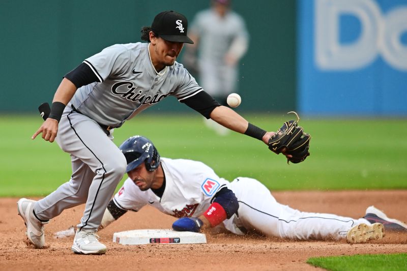 Apr 9, 2024; Cleveland, Ohio, USA; Cleveland Guardians right fielder Ramon Laureano (10) steals second as Chicago White Sox second baseman Lenyn Sosa (50) can not catch the ball from catcher Martin Maldonado (not pictured) during the fourth inning at Progressive Field. Mandatory Credit: Ken Blaze-USA TODAY Sports