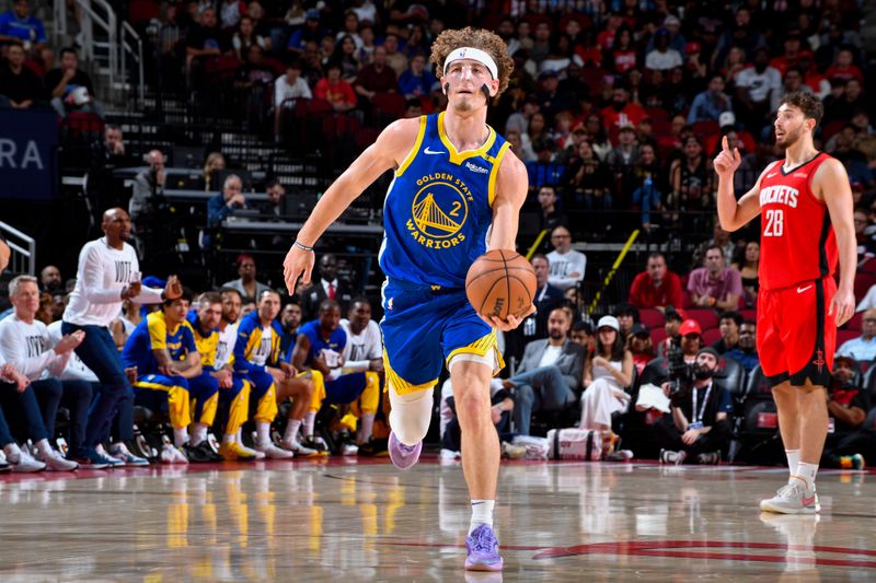 HOUSTON, TX - NOVEMBER 2:  Brandin Podziemski #2 of the Golden State Warriors handles the ball during the game on October 22, 2024 at the Toyota Center in Houston, Texas. NOTE TO USER: User expressly acknowledges and agrees that, by downloading and or using this photograph, User is consenting to the terms and conditions of the Getty Images License Agreement. Mandatory Copyright Notice: Copyright 2024 NBAE (Photo by Logan Riely/NBAE via Getty Images)