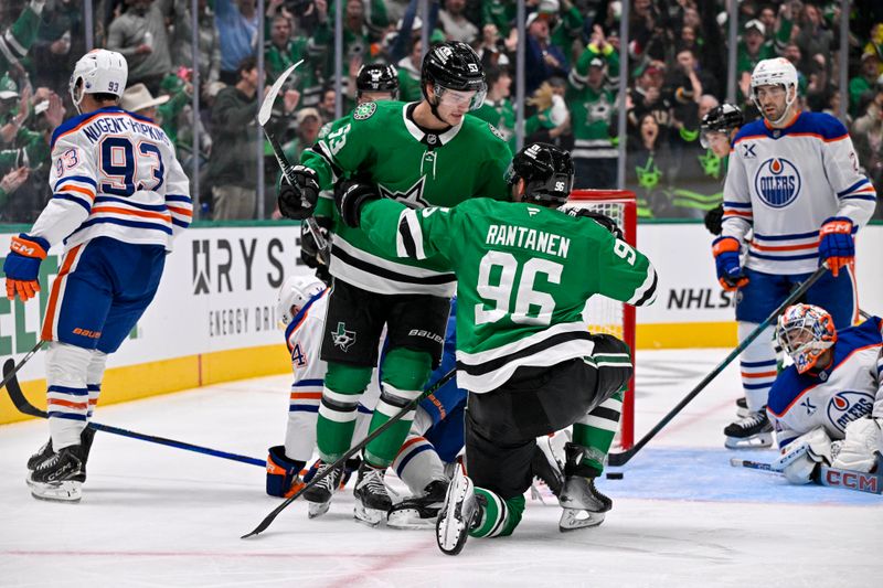 Nov 4, 2025; Dallas, Texas, USA; Dallas Stars center Wyatt Johnston (53) and right wing Mikko Rantanen (96) celebrates a goal scored by Rantanen against Edmonton Oilers goaltender Stuart Skinner (74) during the second period at the American Airlines Center. Rantanen scores his 300th career NHL goal. Mandatory Credit: Jerome Miron-Imagn Images