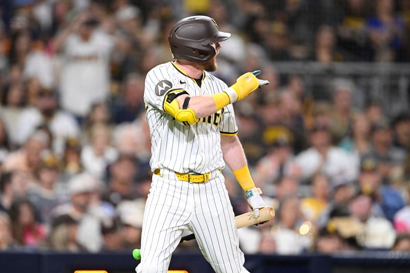Sep 22, 2025; San Diego, California, USA; San Diego Padres second baseman Jake Cronenworth (9) reacts after a called stirke out during the eighth inning against the Milwaukee Brewers at Petco Park. Mandatory Credit: Denis Poroy-Imagn Images