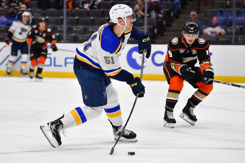 Apr 7, 2024; Anaheim, California, USA; St. Louis Blues defenseman Matthew Kessel (51) scores a goal against the Anaheim Ducks during the first period at Honda Center. Mandatory Credit: Gary A. Vasquez-USA TODAY Sports