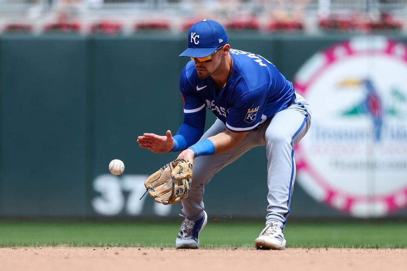May 25, 2025; Minneapolis, Minnesota, USA; Kansas City Royals second base Michael Massey (19) fields the ball hit by Minnesota Twins second baseman Brooks Lee (2) during the fifth inning at Target Field. Mandatory Credit: Matt Krohn-Imagn Images
