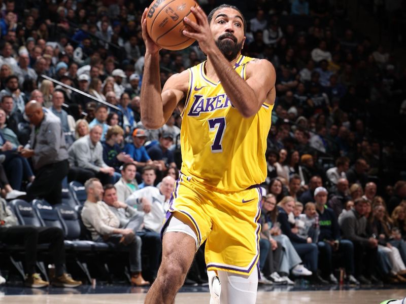 MINNEAPOLIS, MN -  DECEMBER 13:  Gabe Vincent #7 of the Los Angeles Lakers drives to the basket during the game against the Minnesota Timberwolves on December 13, 2024 at Target Center in Minneapolis, Minnesota. NOTE TO USER: User expressly acknowledges and agrees that, by downloading and or using this Photograph, user is consenting to the terms and conditions of the Getty Images License Agreement. Mandatory Copyright Notice: Copyright 2024 NBAE (Photo by David Sherman/NBAE via Getty Images)